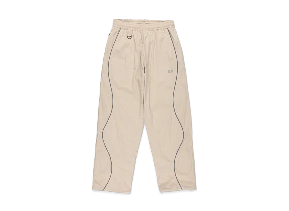 WIND AND SEA Reflective Piping Track Pant "Sand"