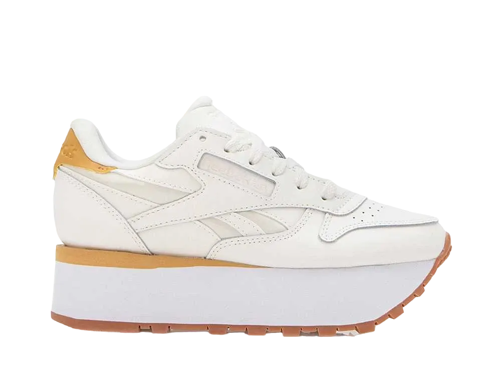 リーボック ウィメンズ クラシックレザー トリプルリフト "チョーク/オレンジ"