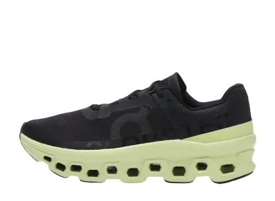 On Cloudmonster "Black/Acacia"