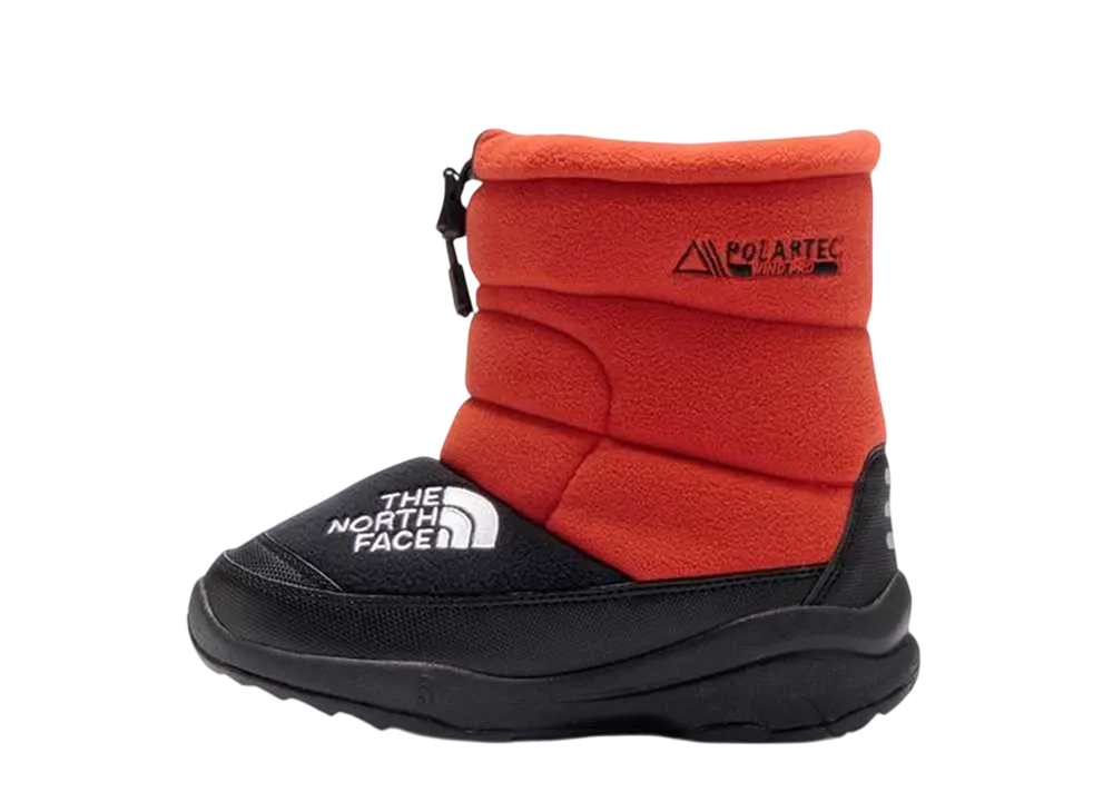 The North Face KIDS Nuptse Bootie 7 Polartec "TNF Orange/TNF Black"