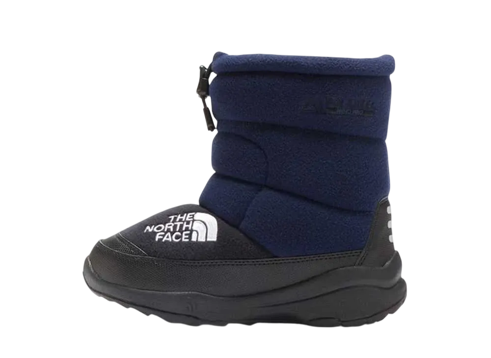 The North Face KIDS Nuptse Bootie 7 Polartec "Urban Navy/TNF Black"
