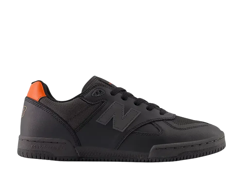 ニューバランス ヌメリック トム ノックス600 "ブラック/オレンジ"