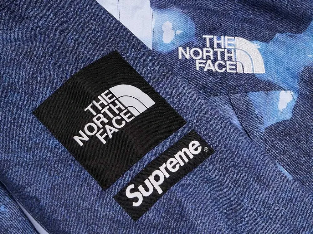 Supreme x The North Face Bleached Denim Print Mountain Jacket