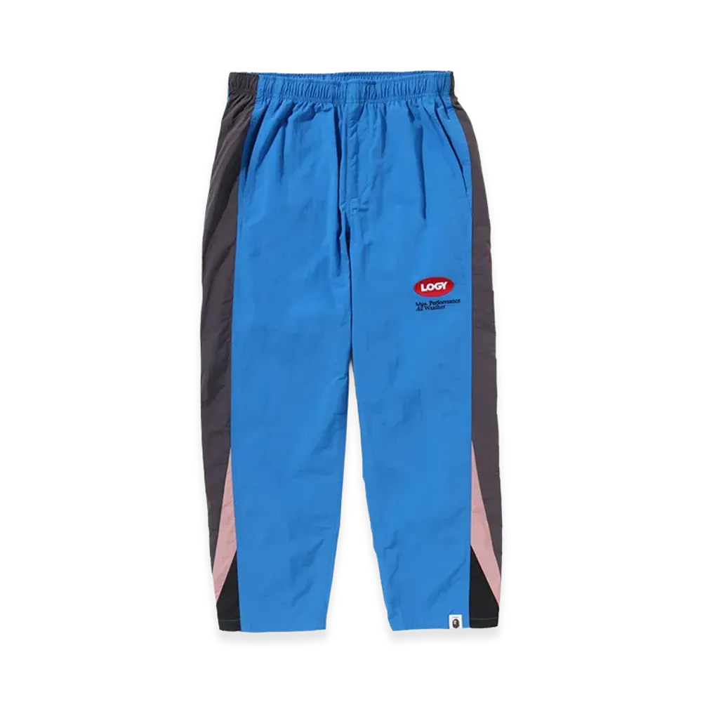 A BATHING APE x KAZUKI KURAISHI Spaceship Uniform Track Pants "Blue"