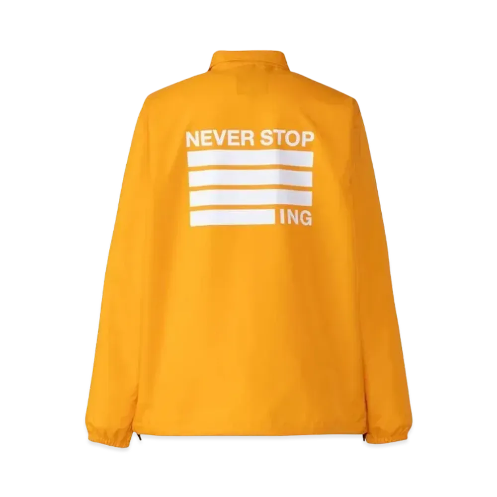 The North Face Never Stop ING The Coach Jacket "Summit Gold"