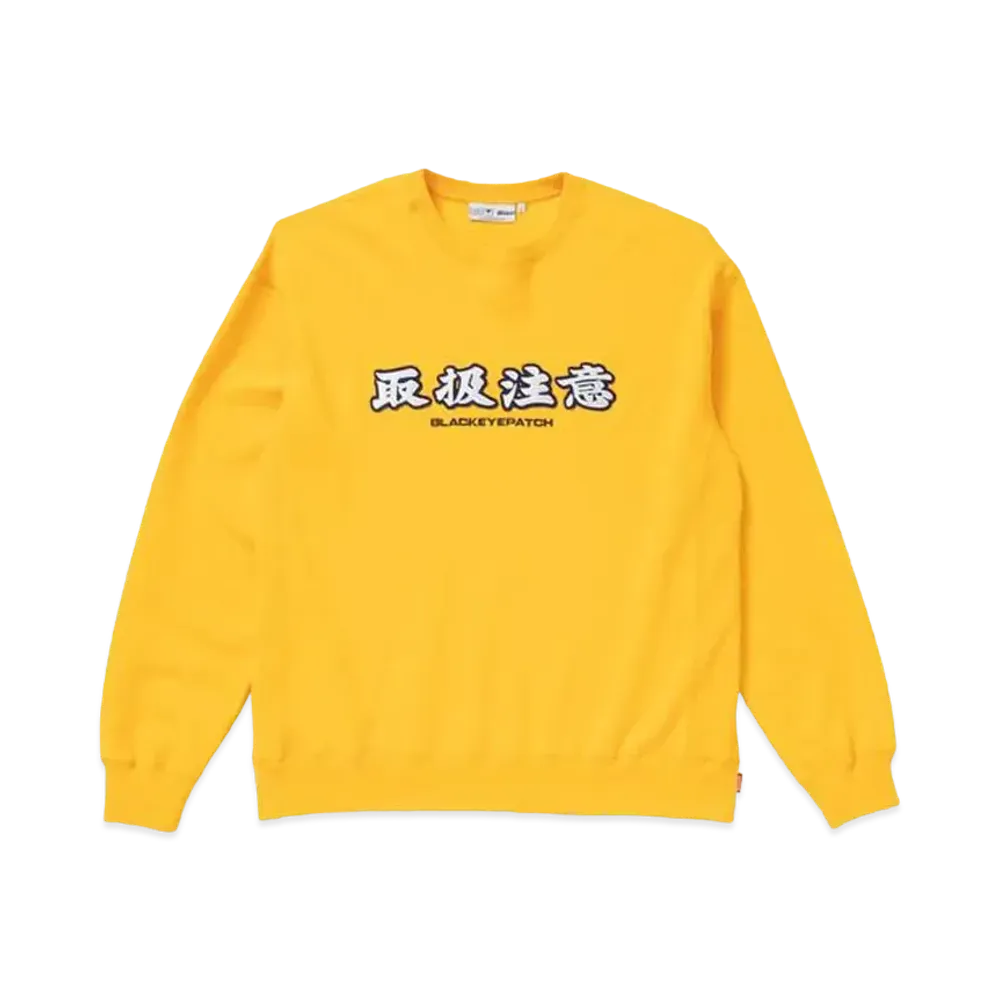 BlackEyePatch HANDLE WITH CARE CREW SWEAT "Yellow"