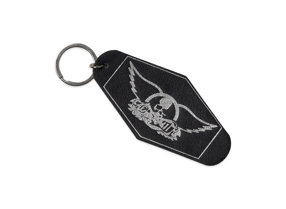 MASTERMIND WORLD x AEROSMITH Wing And Skull Logo Keychain "Black"