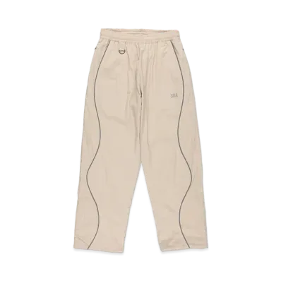 WIND AND SEA Reflective Piping Track Pant "Sand"