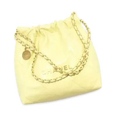 CHANEL 22 Small Handbag Shiny Calfskin & Gold Tone Metal "Yellow"