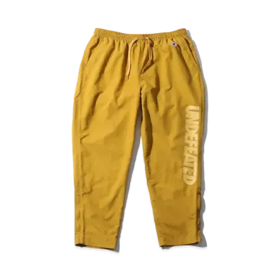 UNDEFEATED CHAMPION LOGO NYLON PANT - C8-P211 "Gold"