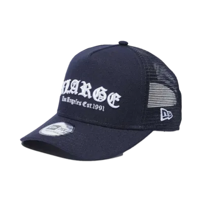 XLARGE XLARGE x NEWERA MESH SNAPBACK CAP D-FRAME TRUCKER "NAVY"