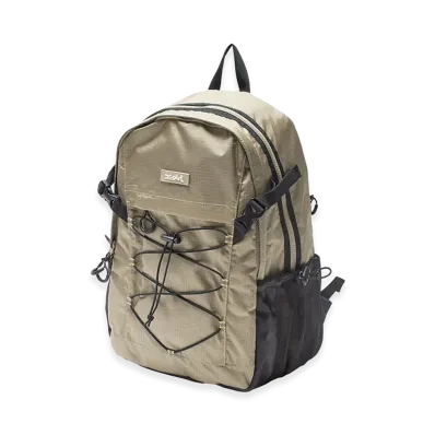 X-Girl Women's Mills Logo Rubber Patch Bungee Cord Backpack "Beige"