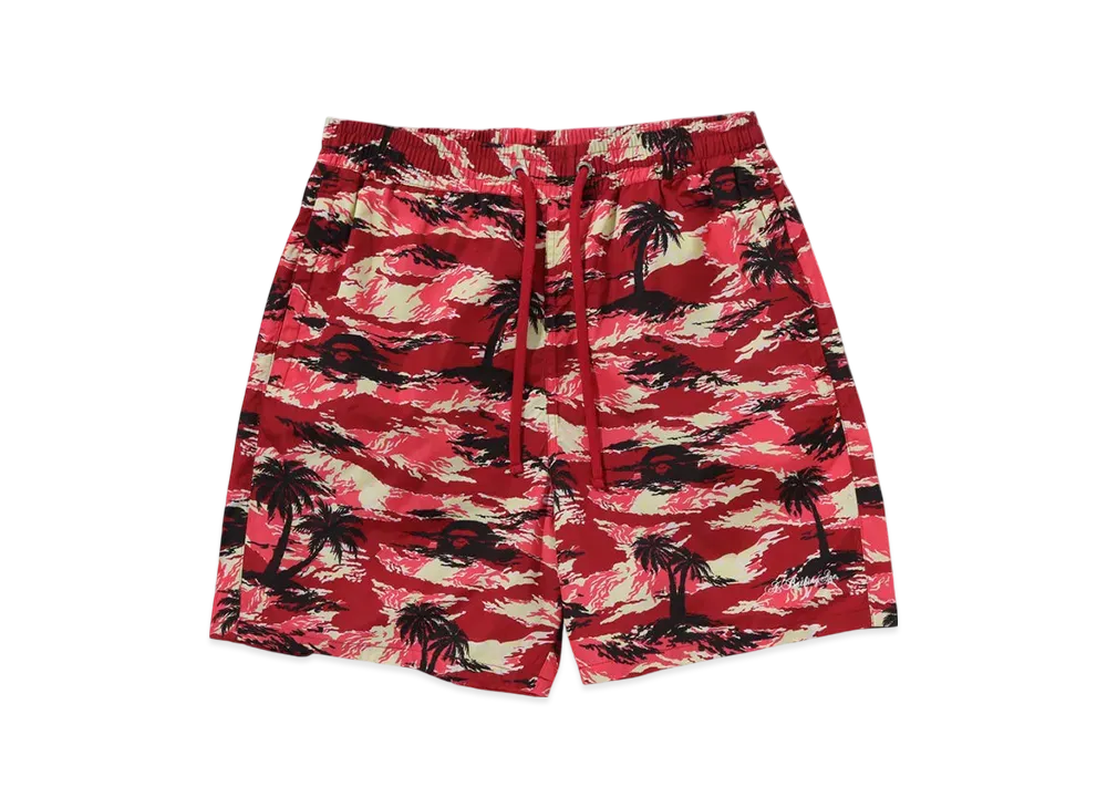A BATHING APE Palm Tree Camo Relaxed Fit Beach Shorts "Red"