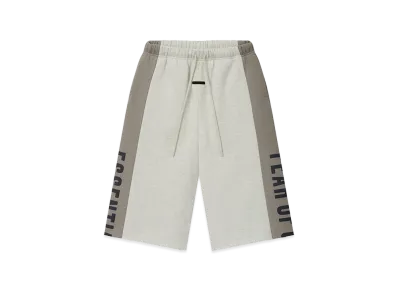 FEAR OF GOD ESSENTIALS Panelled Raw Cut Off Sweatpant "Vanilla Heather/Seal"