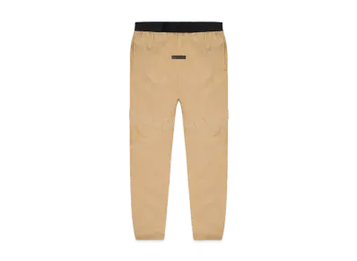 FEAR OF GOD ESSENTIALS Oak Storm Pants "Oak"