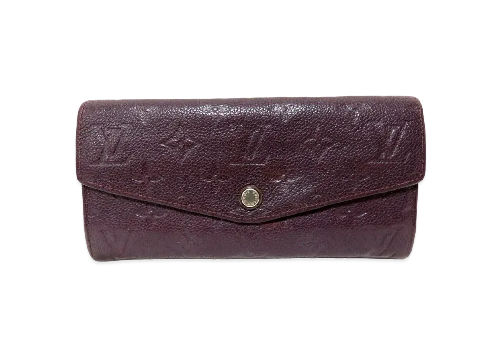 Louis Vuitton Curieux Wallet Monogram Empreinte Leather "Orb"