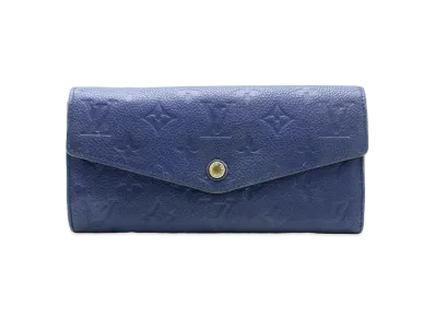 Louis Vuitton Curieux Wallet Monogram Empreinte Leather "Celeste"
