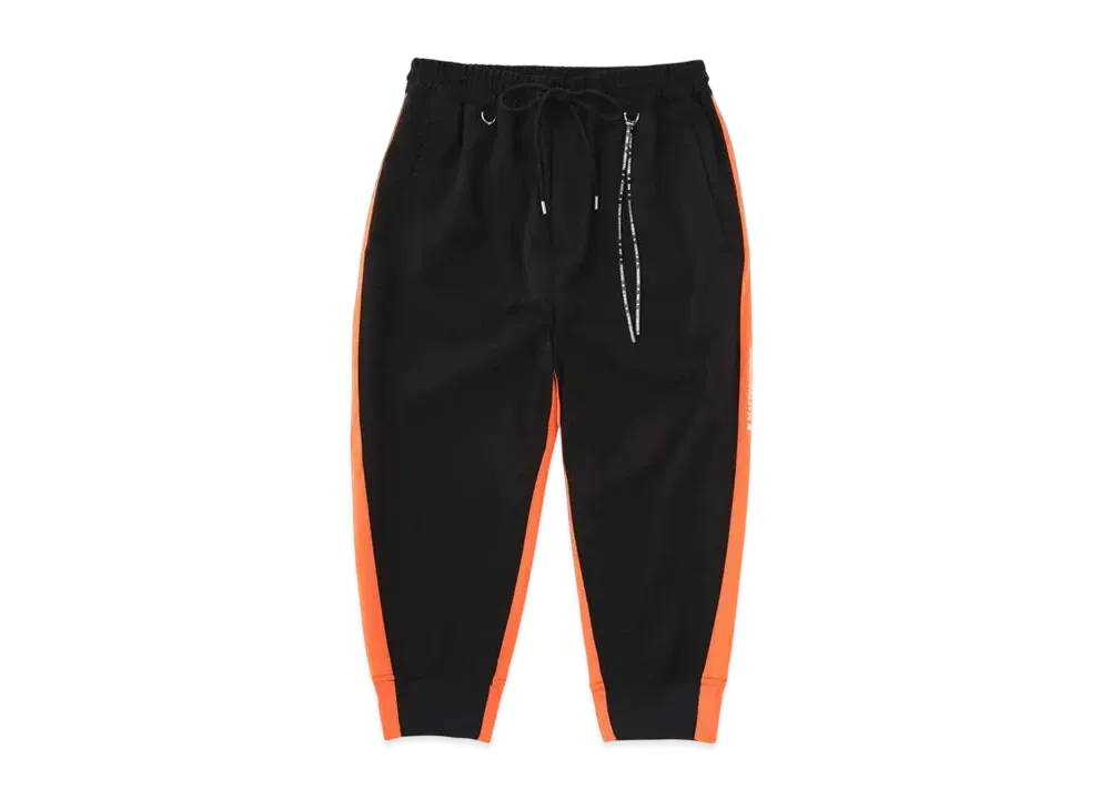 mastermind WORLD Cropped Track Pants "Black Orange"