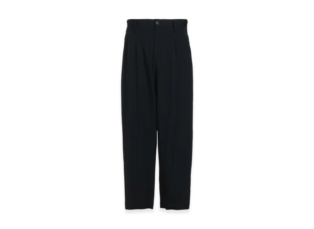 S'YTE Washer Finished Wool Gabardine 2-Tuck Pants With Cut-Out Hem Design "Black"