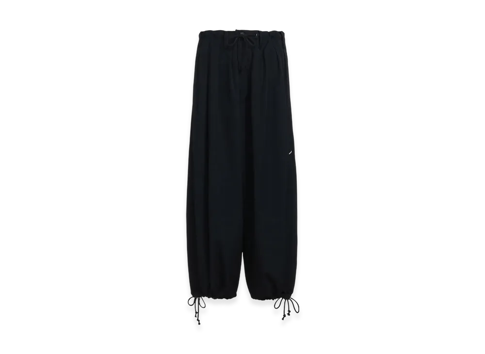 S'YTE Washer Finished Wool Gabardine Balloon Pants With Zipper Pockets "Black"