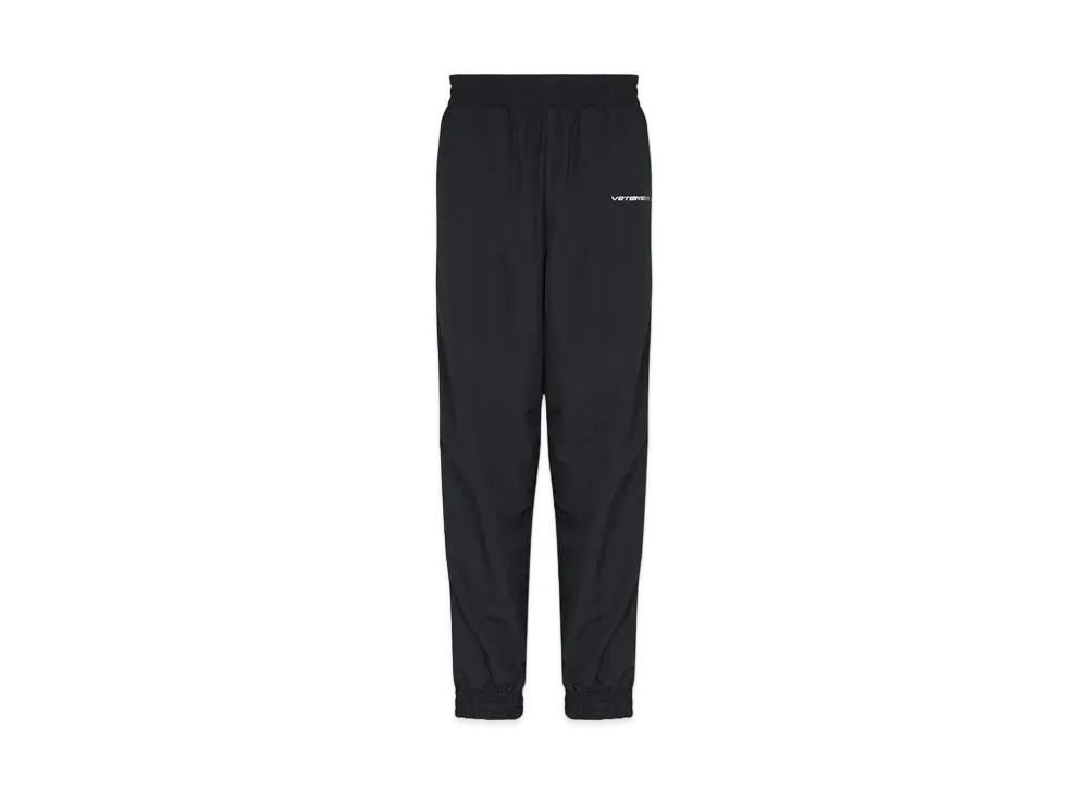 VETEMENTS logo tape track pants "Black"