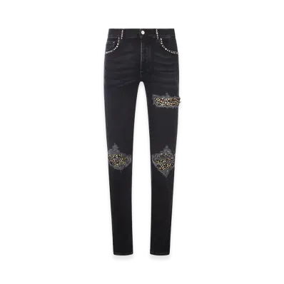 AMIRI Skinny Jeans With Studs And Destroy Details "Black"