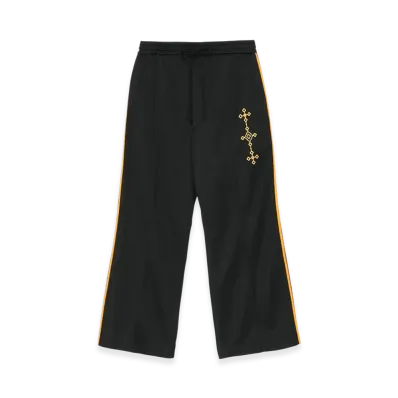S'YTE Pe/Smooth Jersey Geometric Pattern Embroidery Side Tape Line Flare Pants "Black"