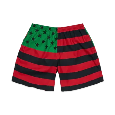 DENIM TEARS Flag Swim Trunks "Red/Black/Green"