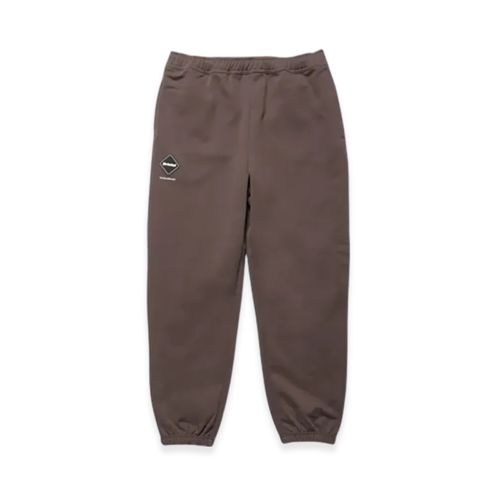 F.C.Real Bristol Emblem Sweat Pants "Brown"