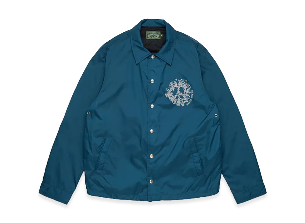 DENIM TEARS Peace Wreath Coaches Jacket "Blue"