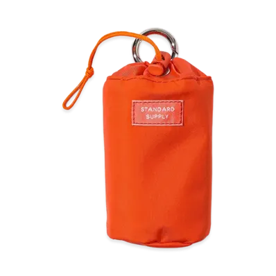 bPr BEAMS x STANDARD SUPPLY Drawstring Charm Pouch "Beams Orange"