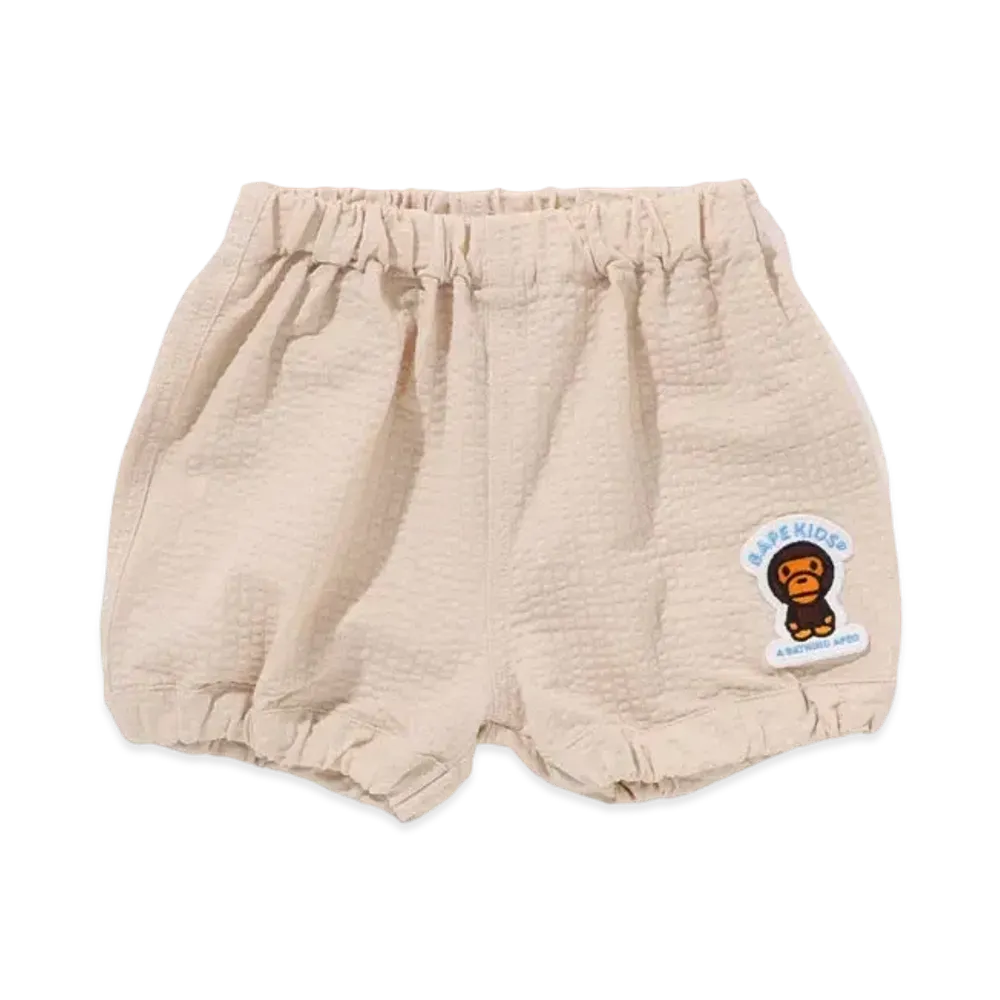 A BATHING APE Baby Milo Patch Baby Shorts "Beige"