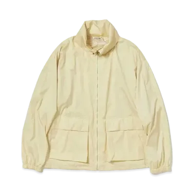 AURALEE Hard Twist Polyester Satin Laminate Zip Blouson "Light Beige"