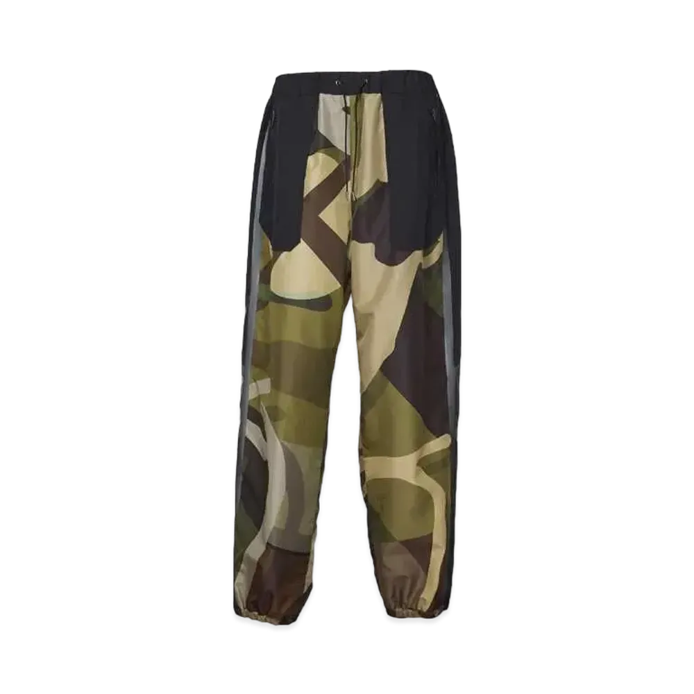 sacai KAWS Track Pants "Camo"