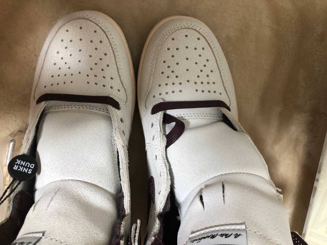 スニダンで購入したアママのジョーダン1のつま先の穴が左右非対称なんですが本物です