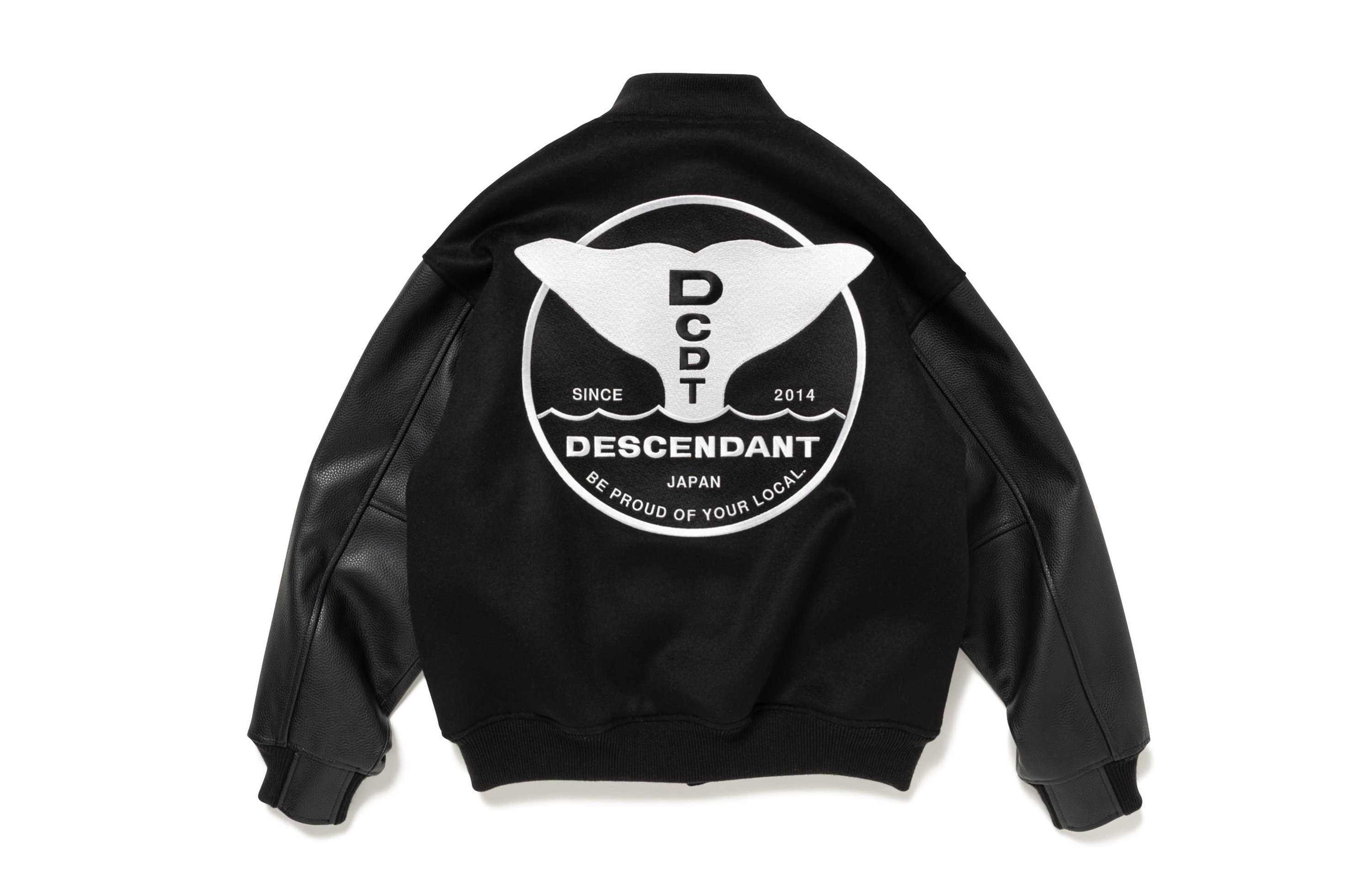 DESCENDANT、クジラの尾びれモチーフのグラフィックがインパクト大なバーシティジャケットを発売