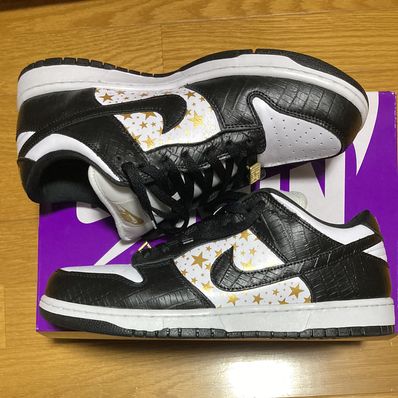 Supreme × Nike SB Dunk Low OG QS Gold Stars "White/Black"