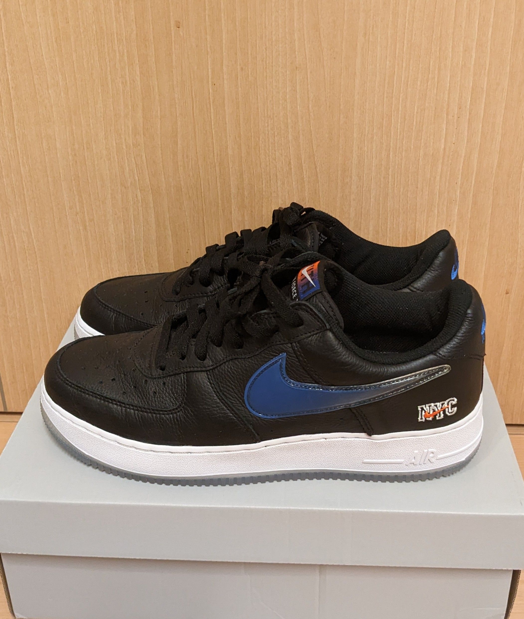 KITH × Nike Air Force 1 Low New York Knicks "Black/Brilliant Orange/Rush/Brilliant White"