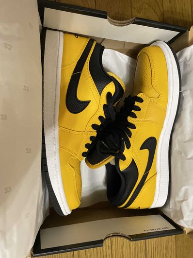 NIKE AIR JORDAN 1 LOW "UNIVERSITY GOLD"