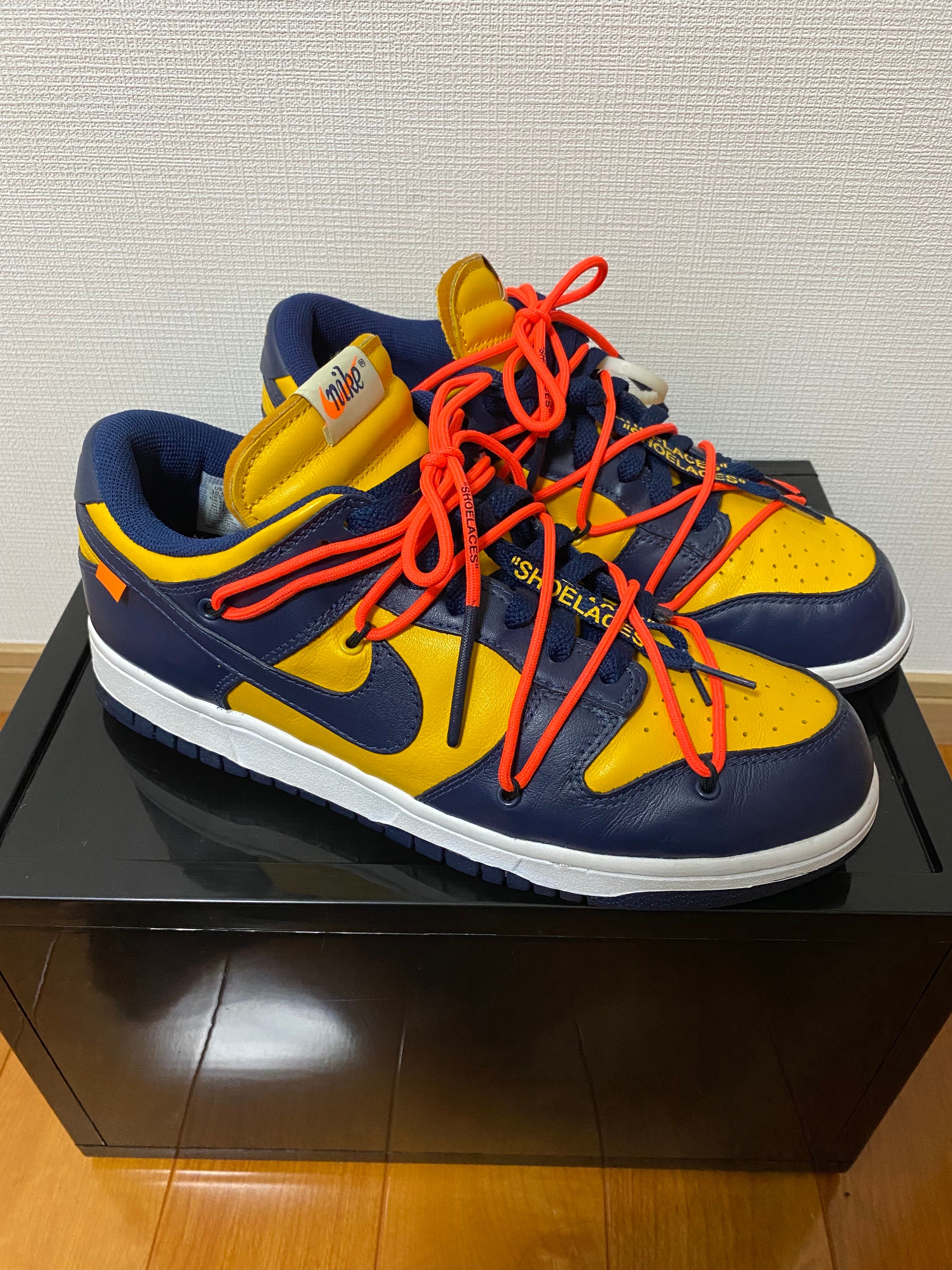Off-White × Nike Dunk Low LTHR "University Gold/Midnight Navy/White"