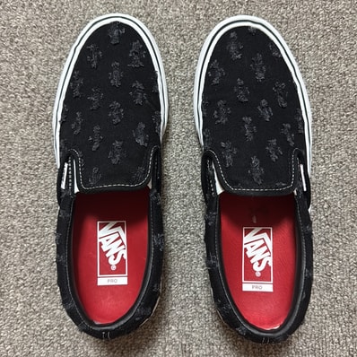 Supreme × Vans Slip-On Hole Punch Denim "Black"