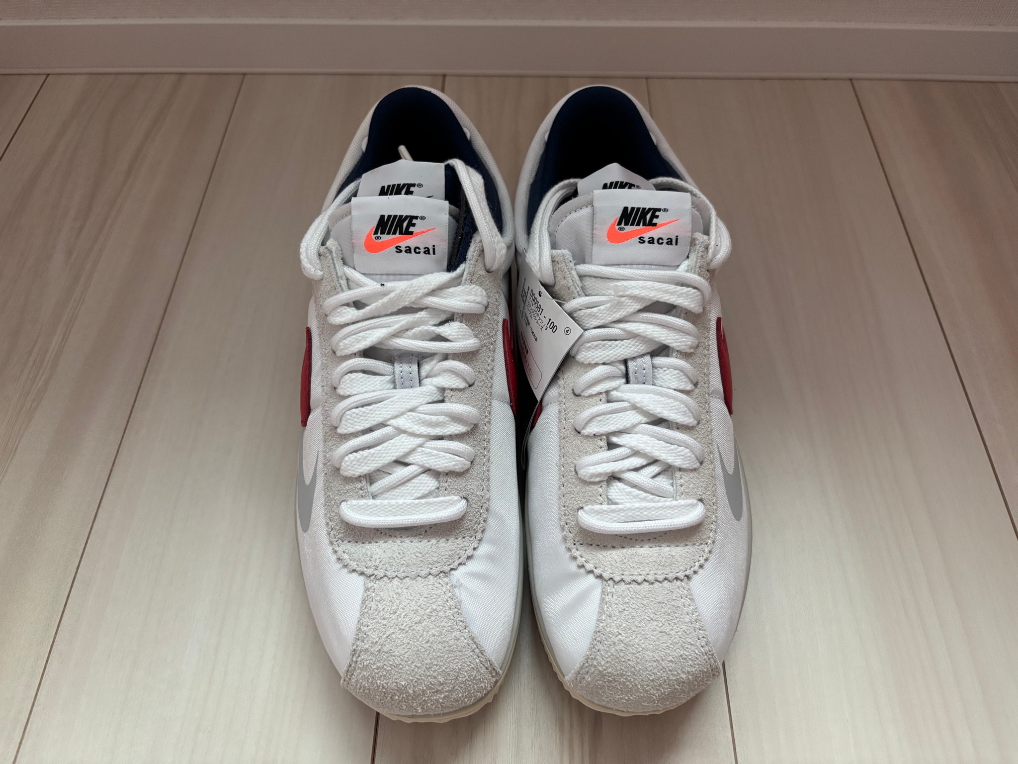 sacai × Nike Zoom Cortez "White and University Red"