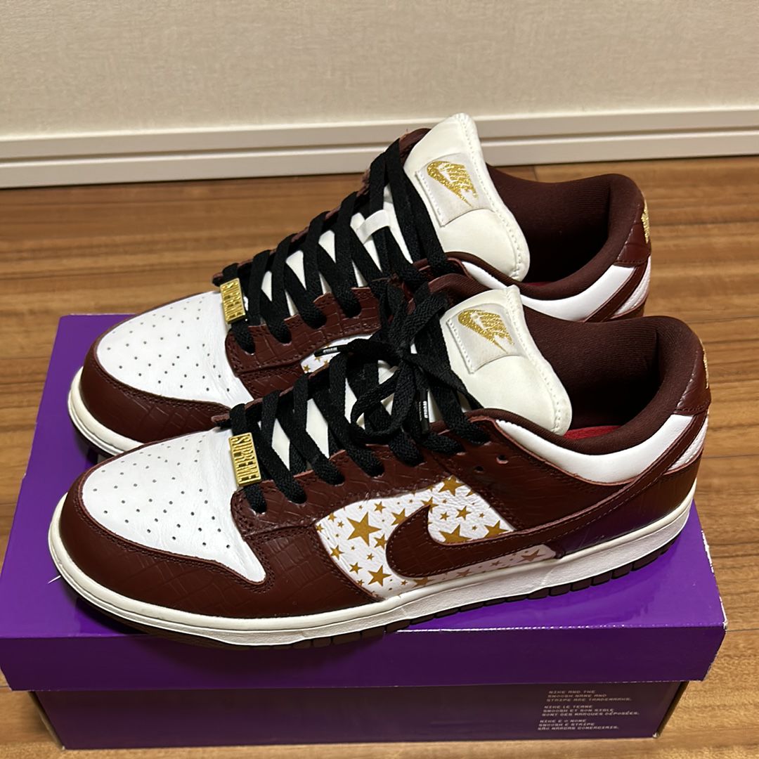 Supreme × Nike SB Dunk Low OG QS Gold Stars "White/Barkroot Brown"