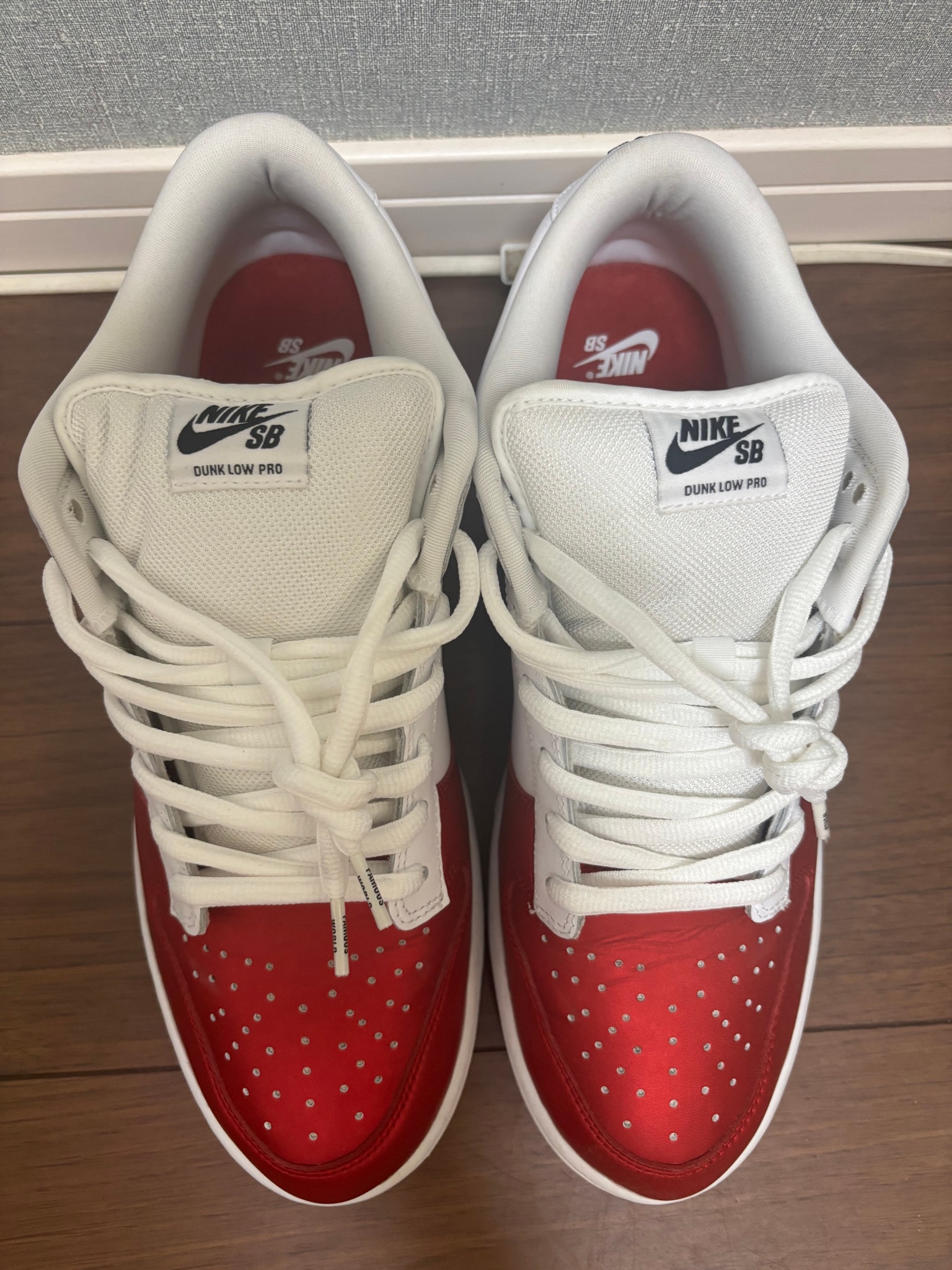 Supreme × Nike Dunk Low "Varsity Red/White"