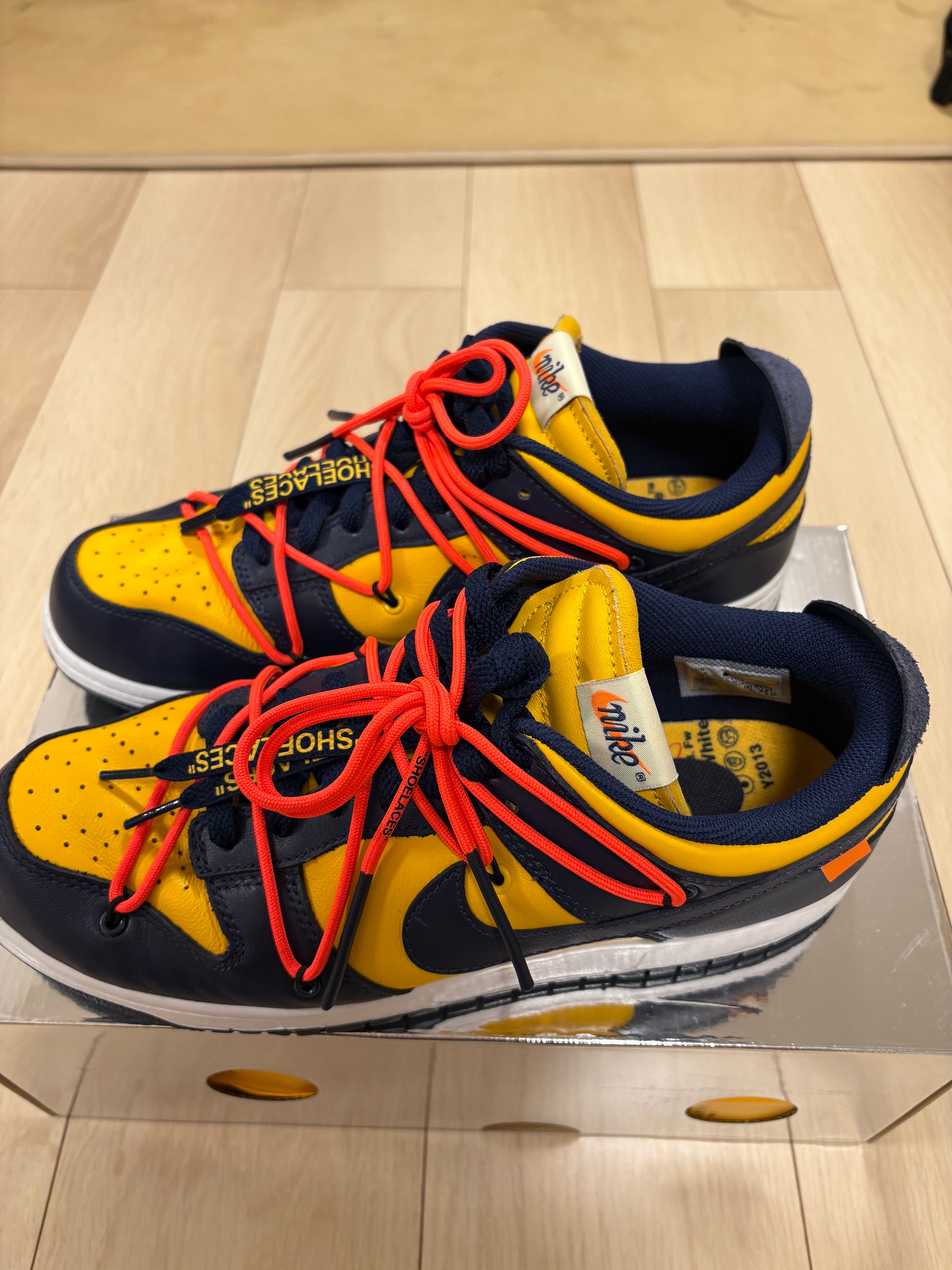 Off-White × Nike Dunk Low LTHR "University Gold/Midnight Navy/White"
