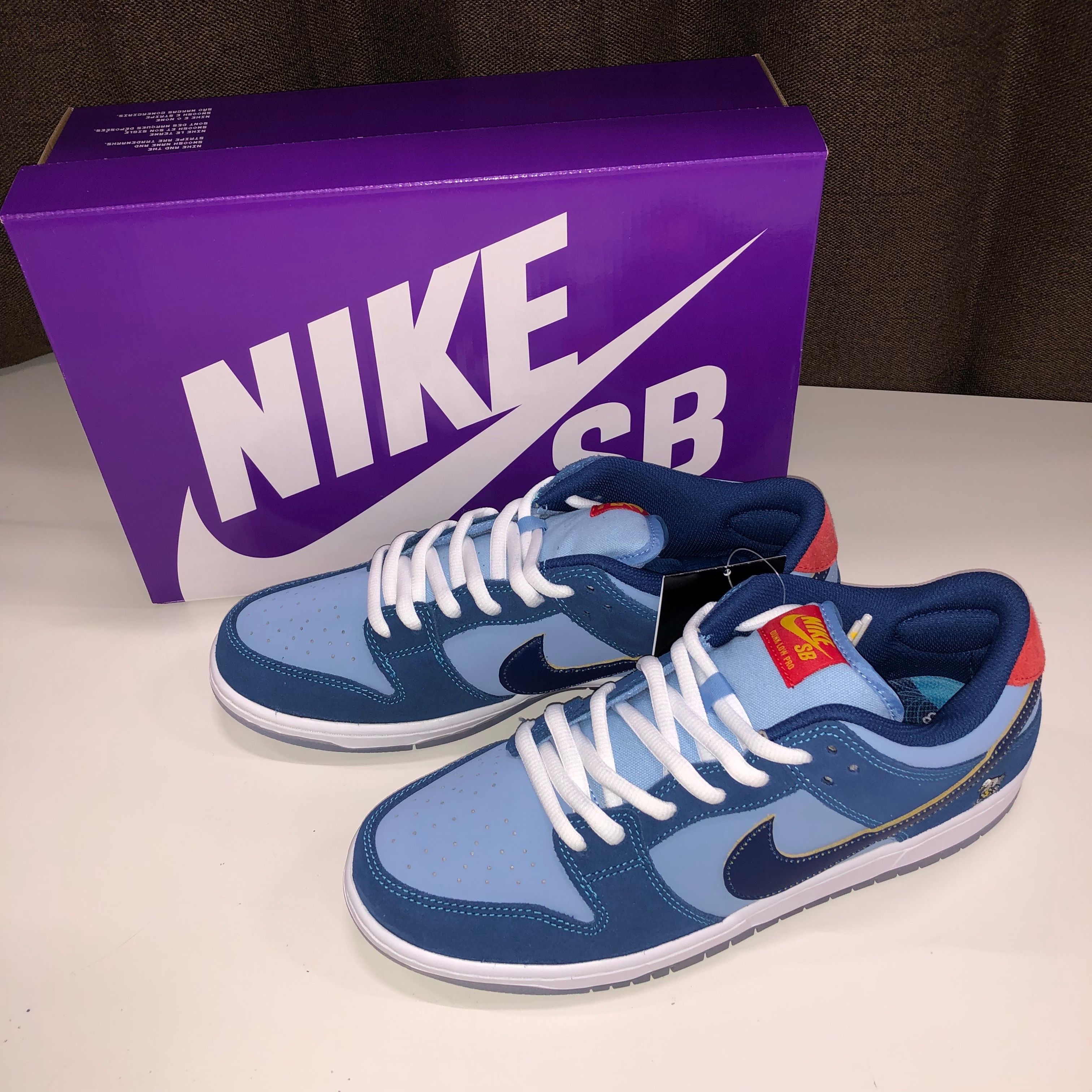 Why So Sad? × Nike SB Dunk Low "Coastal Blue/Speed Yellow-University Red"