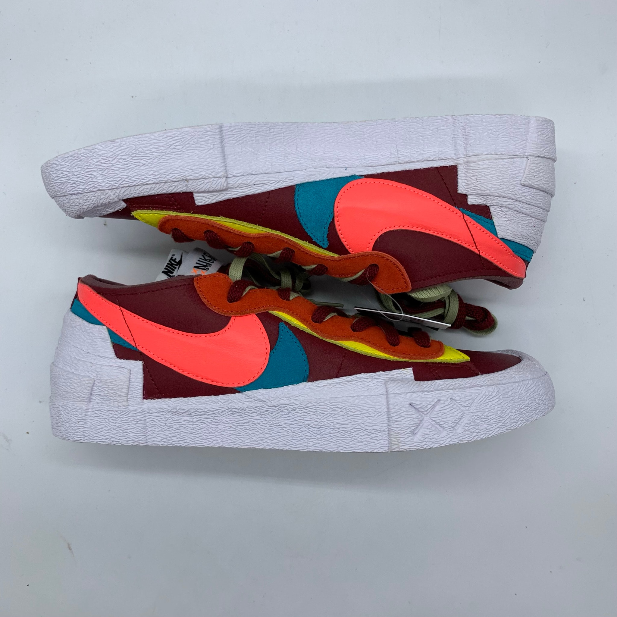 KAWS × sacai × Nike Blazer Low "Team Red"