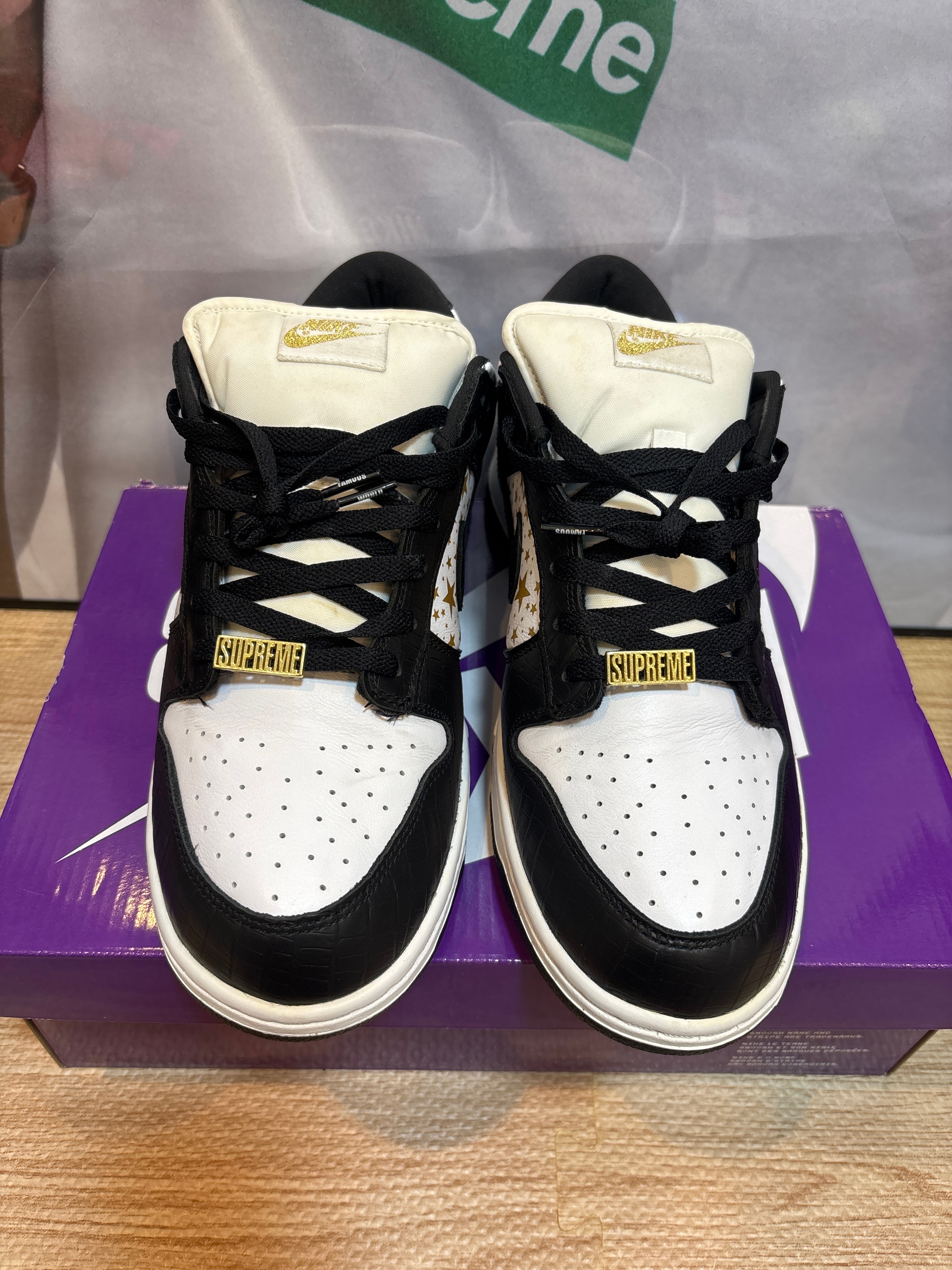 Supreme × Nike SB Dunk Low OG QS Gold Stars "White/Black"