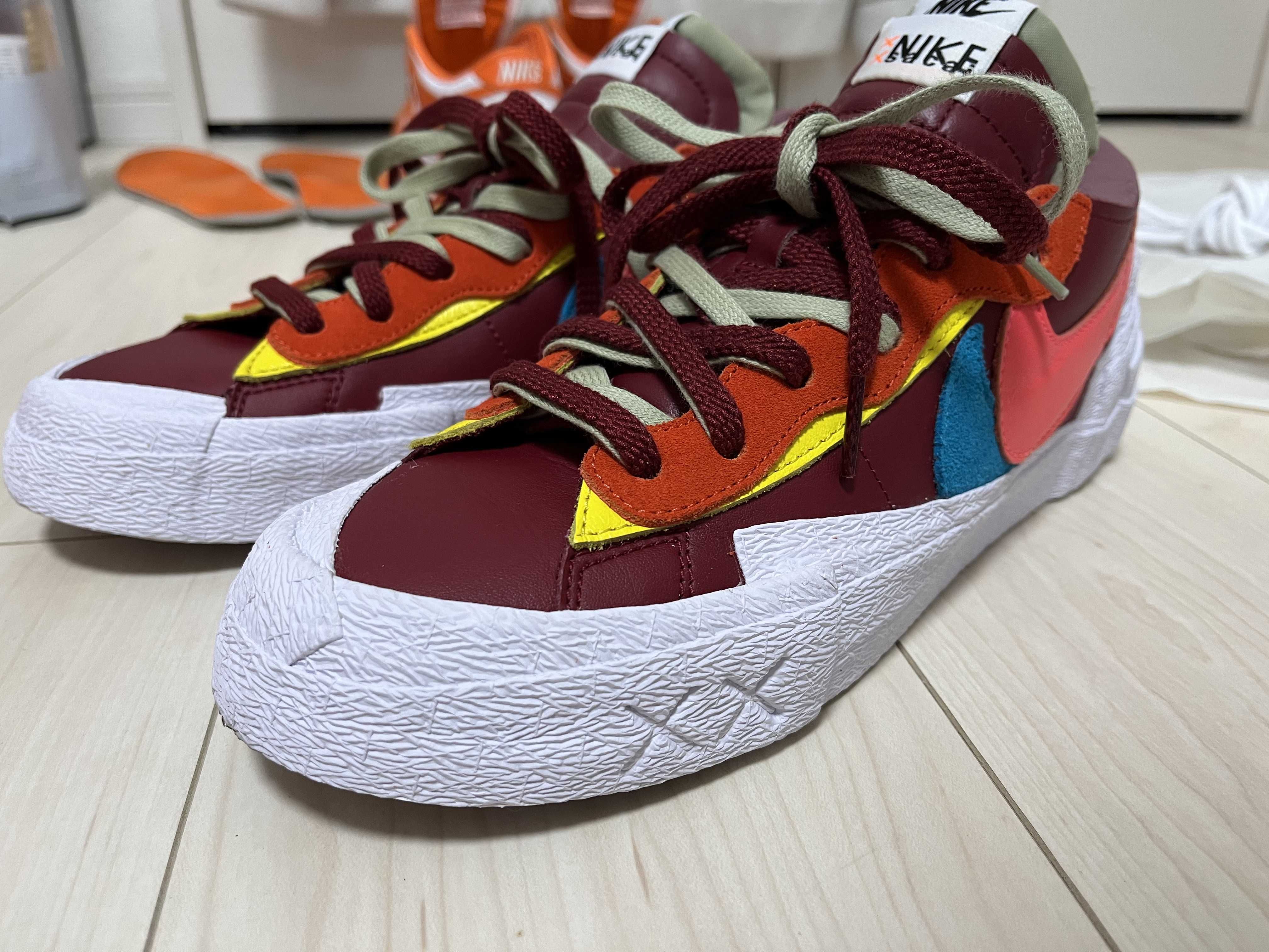 KAWS × sacai × Nike Blazer Low "Team Red"