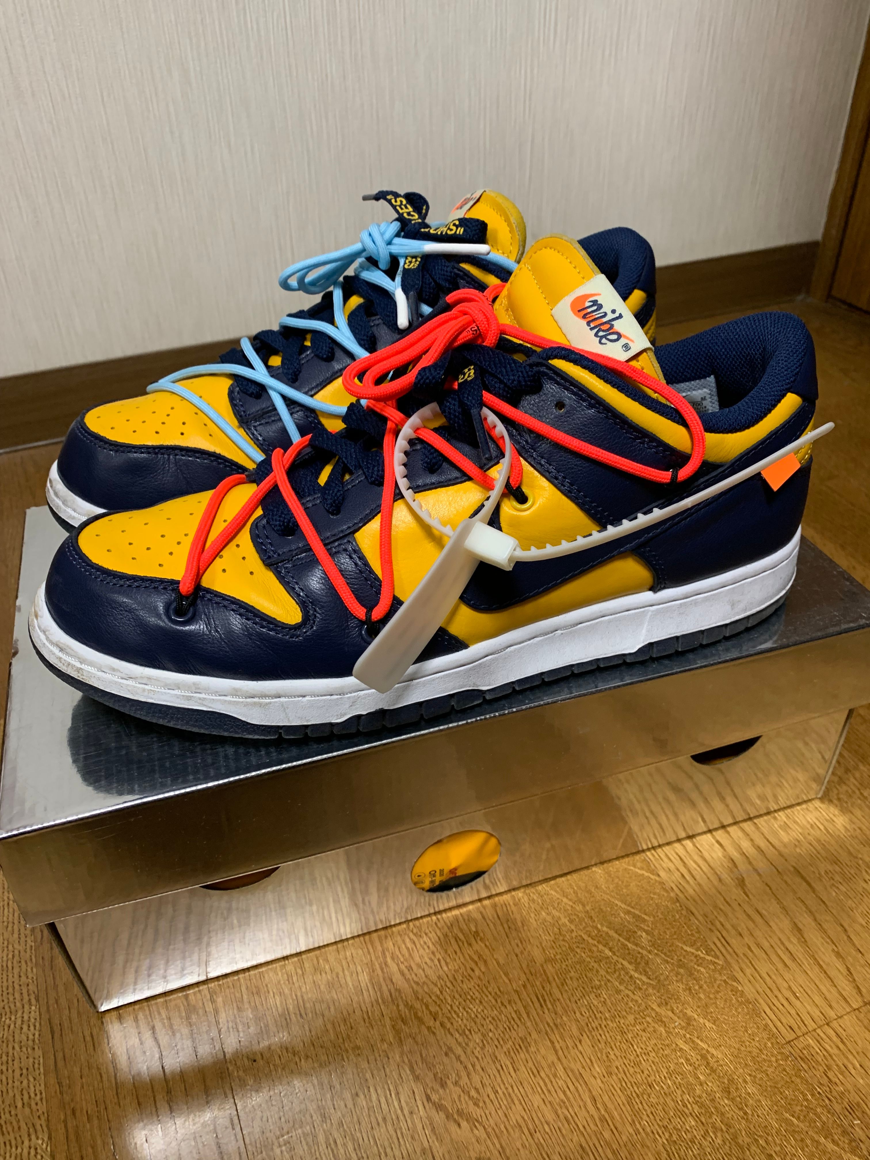 Off-White × Nike Dunk Low LTHR "University Gold/Midnight Navy/White"